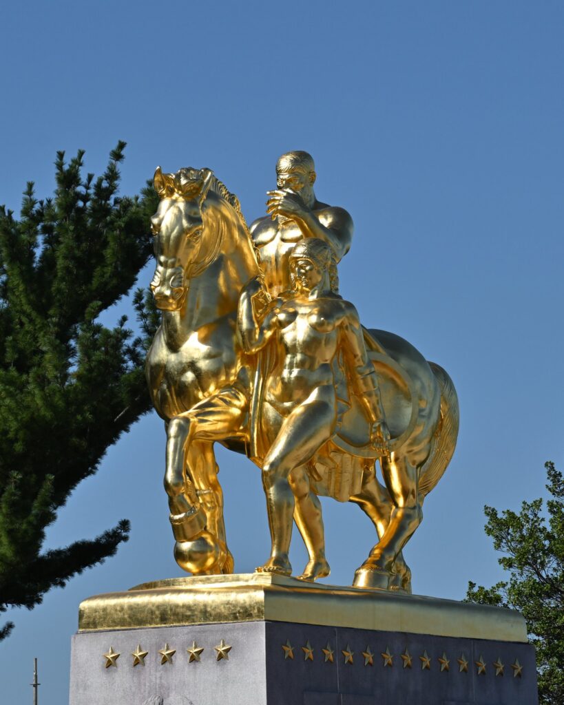 One of the regilded statues in gold leaf.