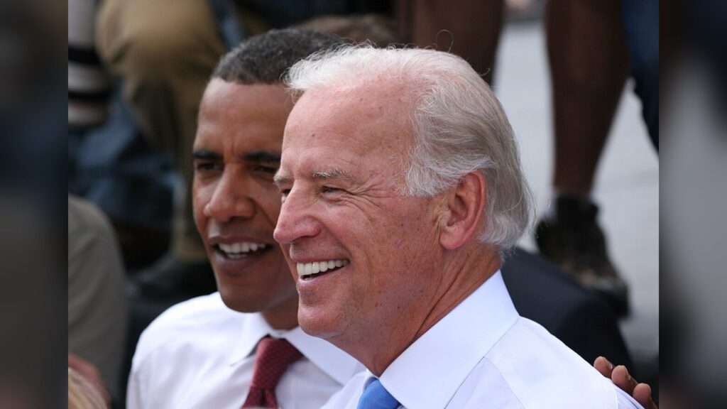 Joe Biden, president, wanders off into a field during the G7 summit.