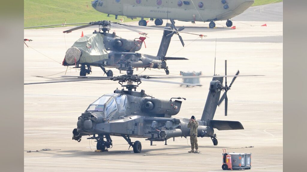 An AH-64 Apache attack helicopter crashed in a field south of Salado.