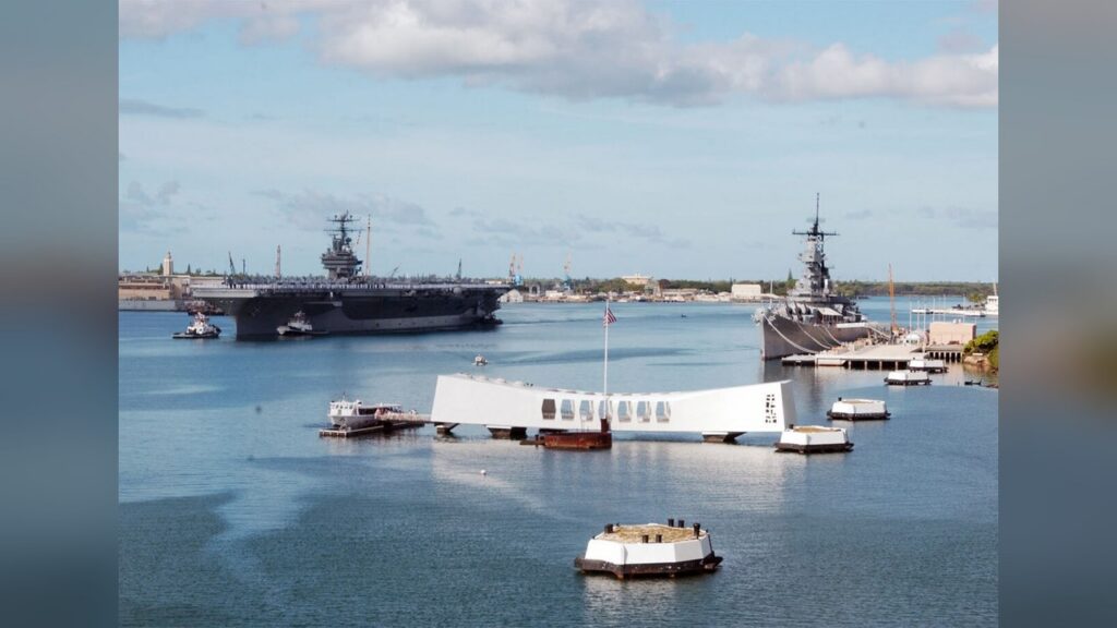 The USS Abraham Lincoln aircraft carrier with sailors aboard after nine months at sea.