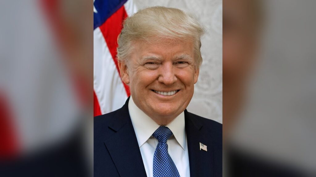 President Donald Trump referenced as the 'draft-dodging, crook president' by Ossoff.